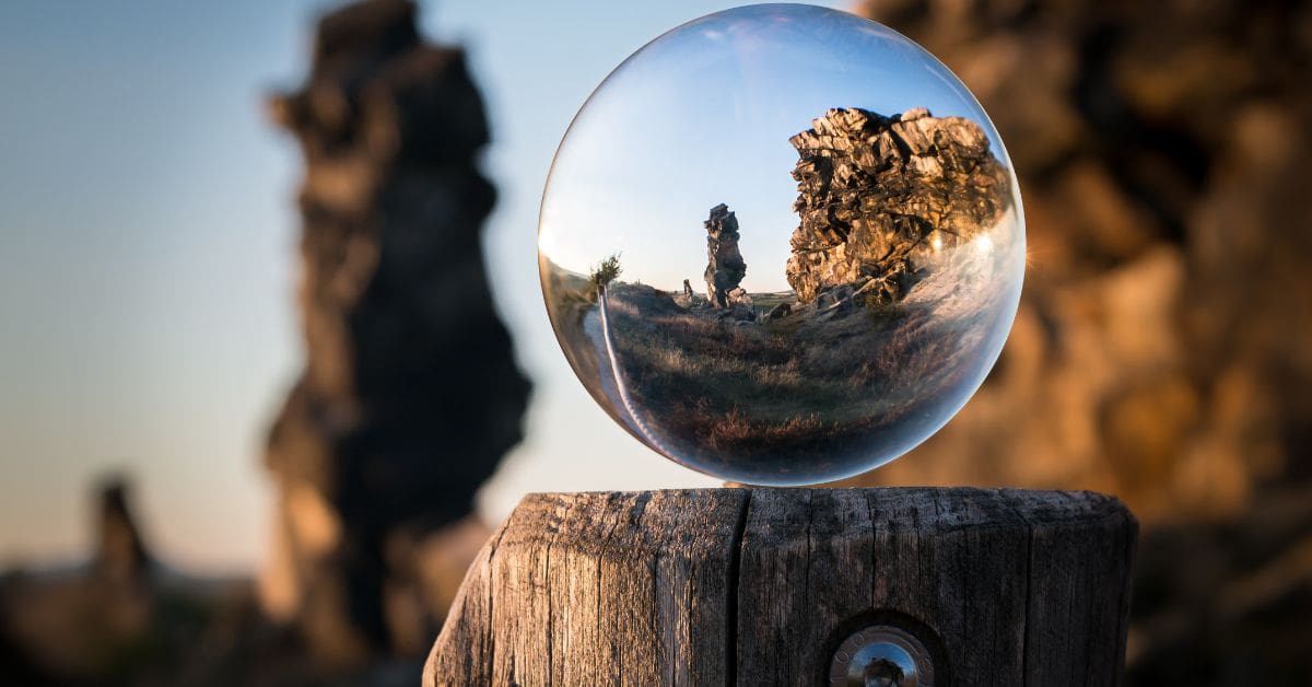 looking through a clear ball, similar to the pursuit of trust by a sage archetype