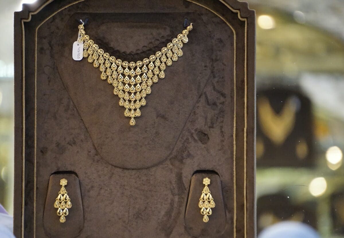 an image of an ornate necklace & earrings set. Jewels are often used by lovers as gifts to express themselves.