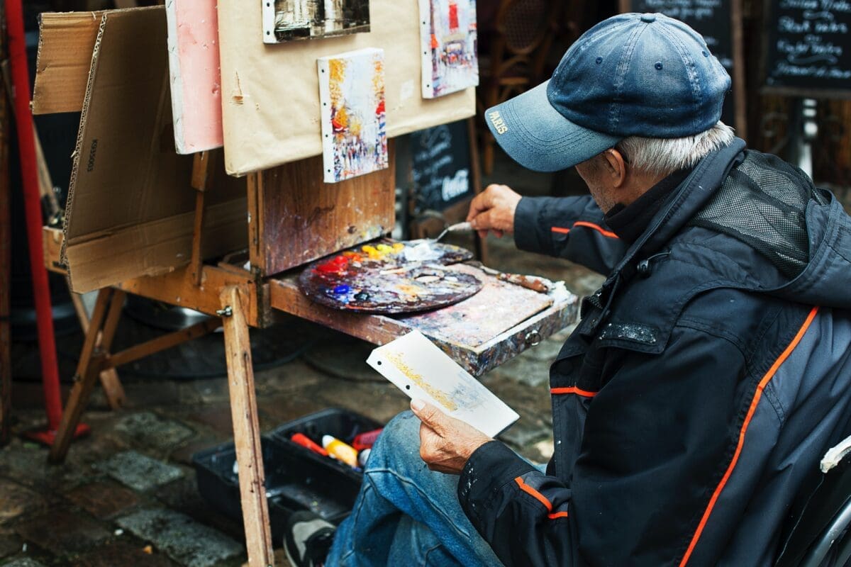 A man Painting indicating creator archetype